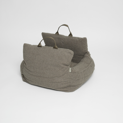 Lara dog car seat in teddy fleece with padded bolsters and carry handles