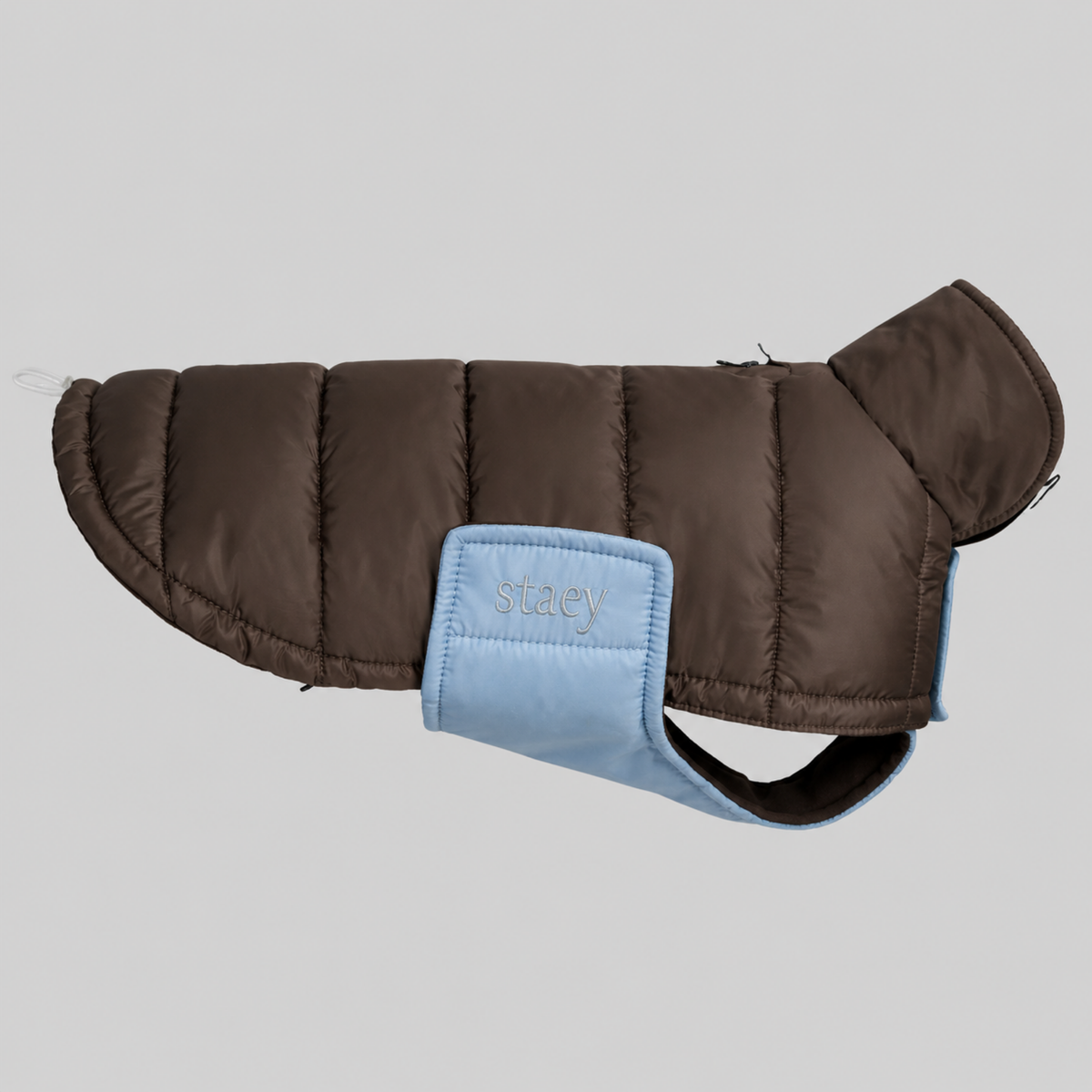 Nora quilted dog coat in espresso with a sky blue chest panel