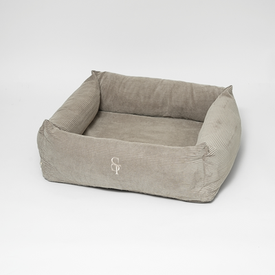Vera dog bed in dune corduroy with an embossed Staey monogram
